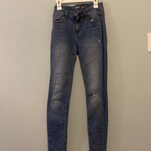 Mid rise semi-ripped jeans